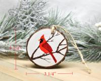 A handmade northern cardinal wood slice Christmas ornament with measurements displayed at Cove Creek Photography.