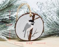 A hand-painted Carolina chickadee ornament with dimensions at covecreekphotography.com.